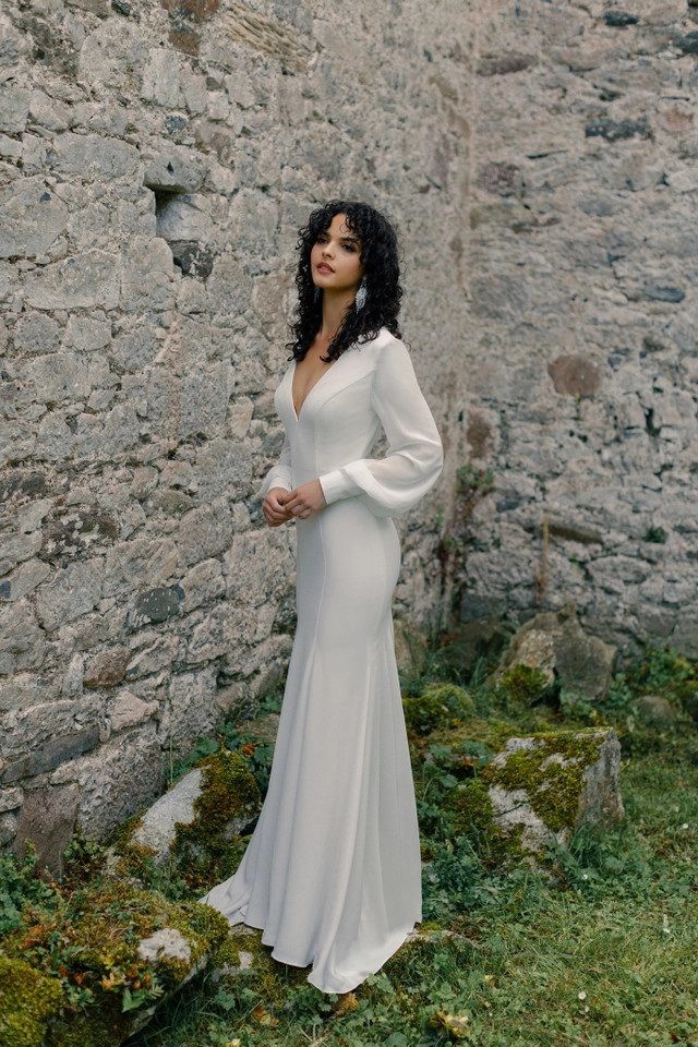 Model wearing white dress