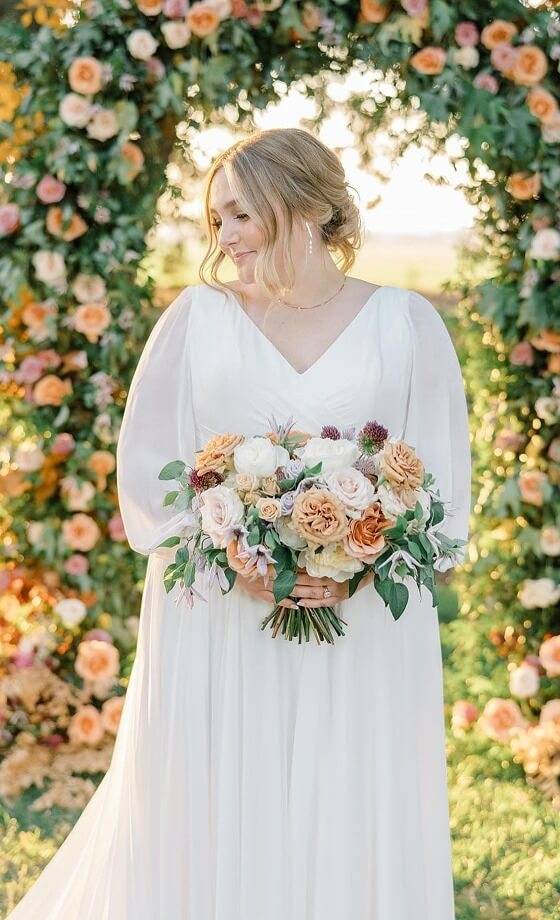 Model wearing a white bridal gown